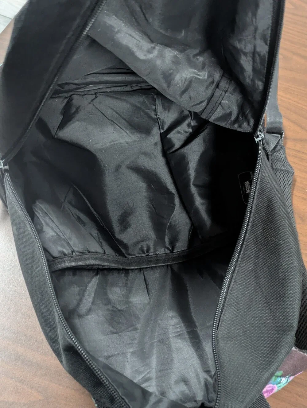 Black Backpack with Floral Front Pocket. Panic At The Disco!